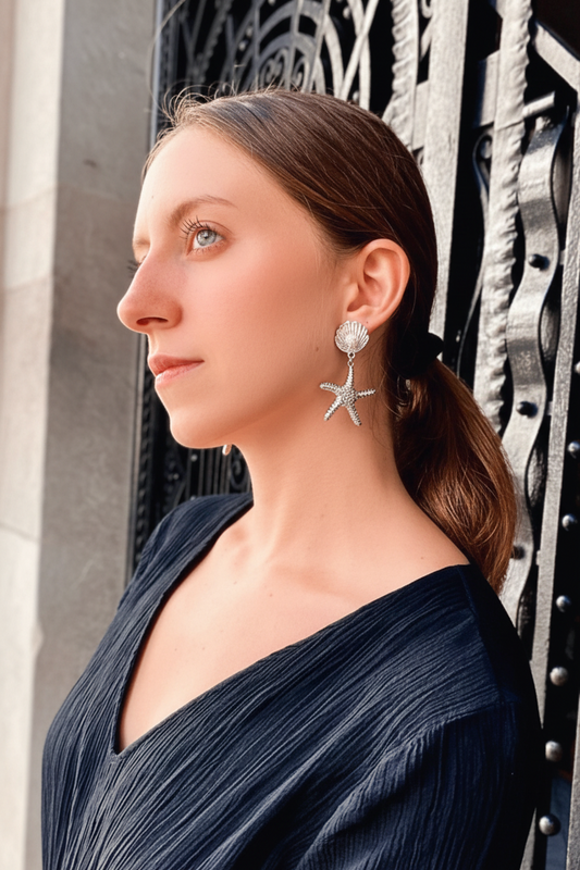 Pendiente de estrella con perla